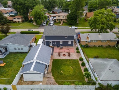 This stunning two-story home with an expansive and inviting on Waters Edge Golf Club in Illinois - for sale on GolfHomes.com, golf home, golf lot