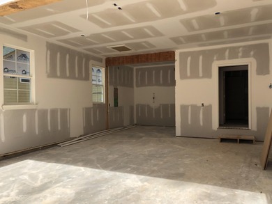 Discover Southern elegance in this exquisite Wescott Elevation A on Woodside Plantation Country Club in South Carolina - for sale on GolfHomes.com, golf home, golf lot