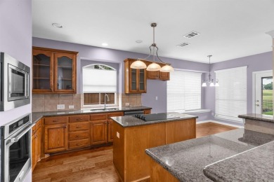 Resort-style living in Stonebridge Ranch! Set on the 14th tee of on Stonebridge Ranch Country Club in Texas - for sale on GolfHomes.com, golf home, golf lot