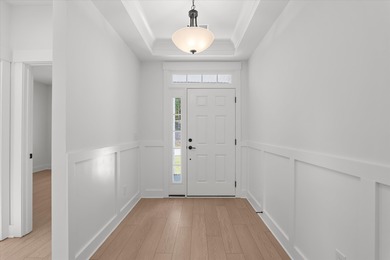 Discover Southern elegance in this exquisite Wescott Elevation A on Woodside Plantation Country Club in South Carolina - for sale on GolfHomes.com, golf home, golf lot