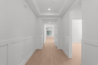 Discover Southern elegance in this exquisite Wescott Elevation A on Woodside Plantation Country Club in South Carolina - for sale on GolfHomes.com, golf home, golf lot