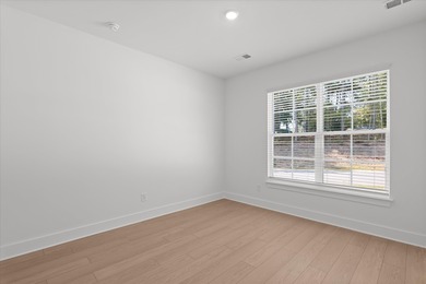 Discover Southern elegance in this exquisite Wescott Elevation A on Woodside Plantation Country Club in South Carolina - for sale on GolfHomes.com, golf home, golf lot