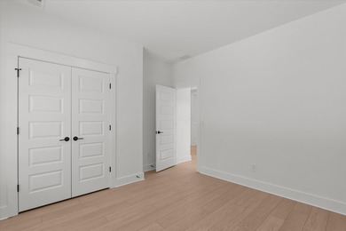 Discover Southern elegance in this exquisite Wescott Elevation A on Woodside Plantation Country Club in South Carolina - for sale on GolfHomes.com, golf home, golf lot