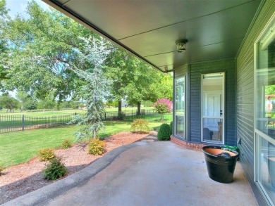 ENJOY THE VIEW OF THE GOLF COURSE FROM THE FIFTEENTH FAIRWAY! on Oak Tree National Golf and Country Club in Oklahoma - for sale on GolfHomes.com, golf home, golf lot
