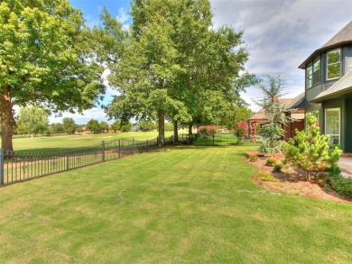 ENJOY THE VIEW OF THE GOLF COURSE FROM THE FIFTEENTH FAIRWAY! on Oak Tree National Golf and Country Club in Oklahoma - for sale on GolfHomes.com, golf home, golf lot