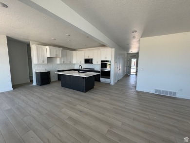 **MODEL HOME: 1037 W Motor Vu Drive, Riverdale, UT 84405** MOVE on Schneiters Riverside Golf Course in Utah - for sale on GolfHomes.com, golf home, golf lot