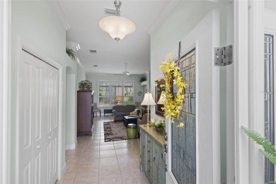 Welcome Home to this stunning Stretched Mandevilla model in the on The Links of Spruce Creek in Florida - for sale on GolfHomes.com, golf home, golf lot