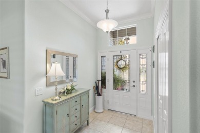Welcome Home to this stunning Stretched Mandevilla model in the on The Links of Spruce Creek in Florida - for sale on GolfHomes.com, golf home, golf lot