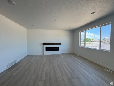 **MODEL HOME: 1037 W Motor Vu Drive, Riverdale, UT 84405** MOVE on Schneiters Riverside Golf Course in Utah - for sale on GolfHomes.com, golf home, golf lot