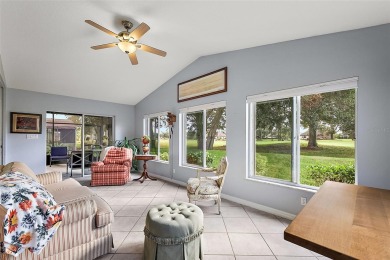 This 3-bedroom former model home sits on Hole 2 of Harbor Hills on Harbor Hills Country Club in Florida - for sale on GolfHomes.com, golf home, golf lot