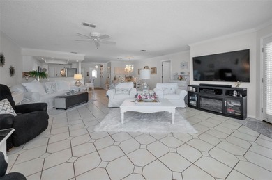 GOLFER'S DELIGHT! END UNIT with stunning GOLF COURSE VIEWS on on Highland Lakes Executive Golf Course in Florida - for sale on GolfHomes.com, golf home, golf lot