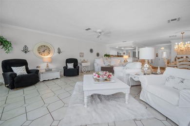 GOLFER'S DELIGHT! END UNIT with stunning GOLF COURSE VIEWS on on Highland Lakes Executive Golf Course in Florida - for sale on GolfHomes.com, golf home, golf lot