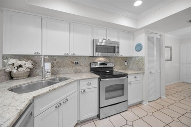 GOLFER'S DELIGHT! END UNIT with stunning GOLF COURSE VIEWS on on Highland Lakes Executive Golf Course in Florida - for sale on GolfHomes.com, golf home, golf lot