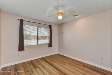 Desirable 3-bedroom, 2-bath corner-end condo with 1-car garage on  in Arizona - for sale on GolfHomes.com, golf home, golf lot