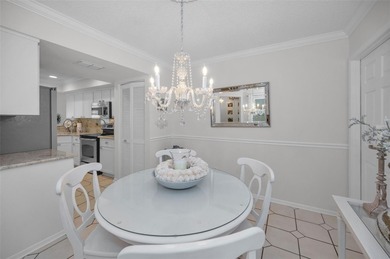 GOLFER'S DELIGHT! END UNIT with stunning GOLF COURSE VIEWS on on Highland Lakes Executive Golf Course in Florida - for sale on GolfHomes.com, golf home, golf lot