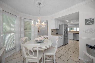 GOLFER'S DELIGHT! END UNIT with stunning GOLF COURSE VIEWS on on Highland Lakes Executive Golf Course in Florida - for sale on GolfHomes.com, golf home, golf lot