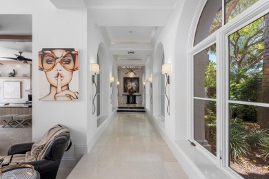 Proudly offered on a premium acre corner lot, this stunning on  in Florida - for sale on GolfHomes.com, golf home, golf lot