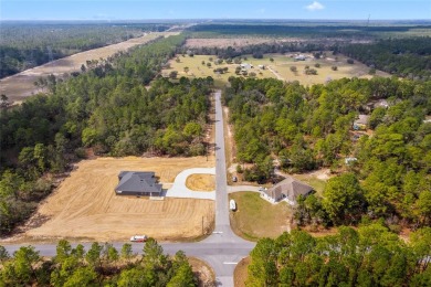 This 1-acre homesite in Citrus Springs is conveniently located on Citrus Springs Country Club in Florida - for sale on GolfHomes.com, golf home, golf lot