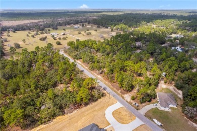 This 1-acre homesite in Citrus Springs is conveniently located on Citrus Springs Country Club in Florida - for sale on GolfHomes.com, golf home, golf lot