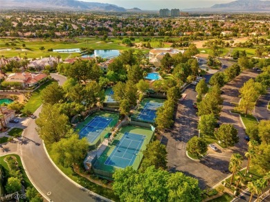 Enjoy expansive golf course views from bright, sun-filled on Canyon Gate Country Club in Nevada - for sale on GolfHomes.com, golf home, golf lot