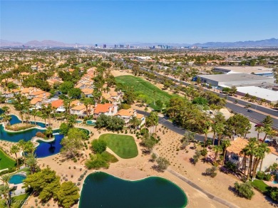 Enjoy expansive golf course views from bright, sun-filled on Canyon Gate Country Club in Nevada - for sale on GolfHomes.com, golf home, golf lot