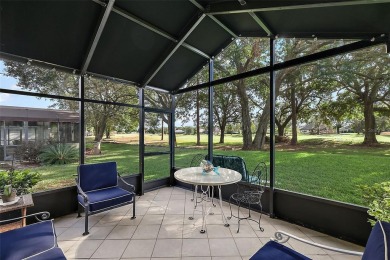 This 3-bedroom former model home sits on Hole 2 of Harbor Hills on Harbor Hills Country Club in Florida - for sale on GolfHomes.com, golf home, golf lot