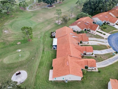 GOLFER'S DELIGHT! END UNIT with stunning GOLF COURSE VIEWS on on Highland Lakes Executive Golf Course in Florida - for sale on GolfHomes.com, golf home, golf lot