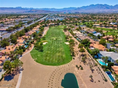 Enjoy expansive golf course views from bright, sun-filled on Canyon Gate Country Club in Nevada - for sale on GolfHomes.com, golf home, golf lot