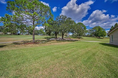 GOLFER'S DELIGHT! END UNIT with stunning GOLF COURSE VIEWS on on Highland Lakes Executive Golf Course in Florida - for sale on GolfHomes.com, golf home, golf lot