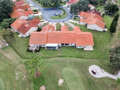 GOLFER'S DELIGHT! END UNIT with stunning GOLF COURSE VIEWS on on Highland Lakes Executive Golf Course in Florida - for sale on GolfHomes.com, golf home, golf lot