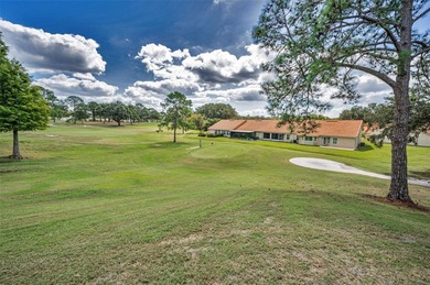 GOLFER'S DELIGHT! END UNIT with stunning GOLF COURSE VIEWS on on Highland Lakes Executive Golf Course in Florida - for sale on GolfHomes.com, golf home, golf lot