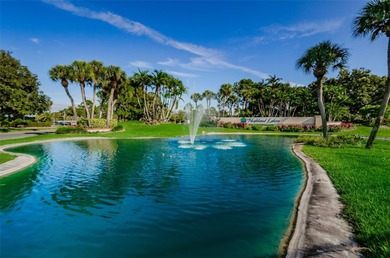 GOLFER'S DELIGHT! END UNIT with stunning GOLF COURSE VIEWS on on Highland Lakes Executive Golf Course in Florida - for sale on GolfHomes.com, golf home, golf lot