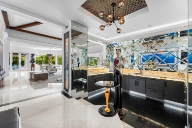 Proudly offered on a premium acre corner lot, this stunning on  in Florida - for sale on GolfHomes.com, golf home, golf lot