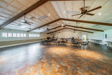 GOLFER'S DELIGHT! END UNIT with stunning GOLF COURSE VIEWS on on Highland Lakes Executive Golf Course in Florida - for sale on GolfHomes.com, golf home, golf lot