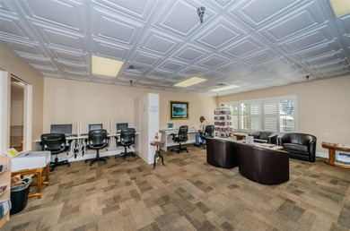 GOLFER'S DELIGHT! END UNIT with stunning GOLF COURSE VIEWS on on Highland Lakes Executive Golf Course in Florida - for sale on GolfHomes.com, golf home, golf lot