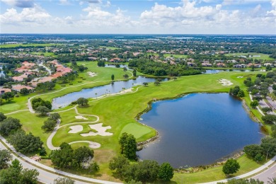 Experience this exquisite home in the sought-after gated golfing on Lakewood Ranch Golf and Country Club in Florida - for sale on GolfHomes.com, golf home, golf lot