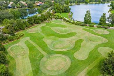 Experience this exquisite home in the sought-after gated golfing on Lakewood Ranch Golf and Country Club in Florida - for sale on GolfHomes.com, golf home, golf lot