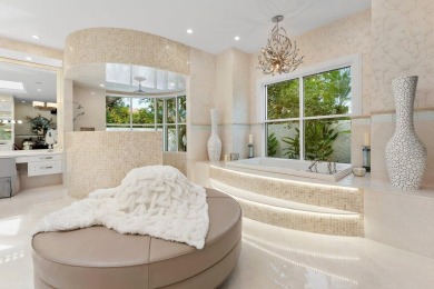 Proudly offered on a premium acre corner lot, this stunning on  in Florida - for sale on GolfHomes.com, golf home, golf lot