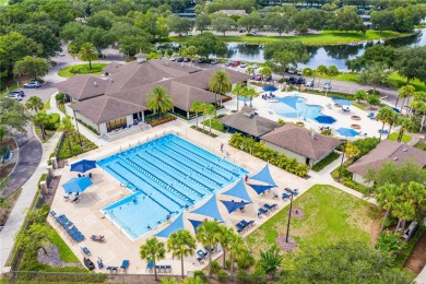 Experience this exquisite home in the sought-after gated golfing on Lakewood Ranch Golf and Country Club in Florida - for sale on GolfHomes.com, golf home, golf lot