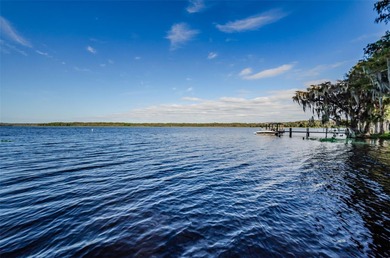 GOLFER'S DELIGHT! END UNIT with stunning GOLF COURSE VIEWS on on Highland Lakes Executive Golf Course in Florida - for sale on GolfHomes.com, golf home, golf lot