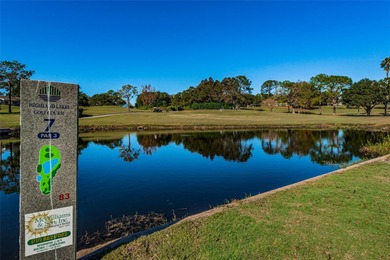 GOLFER'S DELIGHT! END UNIT with stunning GOLF COURSE VIEWS on on Highland Lakes Executive Golf Course in Florida - for sale on GolfHomes.com, golf home, golf lot