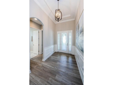 Stunning Biscayne Model in the Gated Woodlands at Longleaf on Seven Springs Golf and Country Club in Florida - for sale on GolfHomes.com, golf home, golf lot