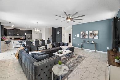 Beautifully furnished and very well maintained 7-bedroom on ChampionsGate Golf Resort in Florida - for sale on GolfHomes.com, golf home, golf lot