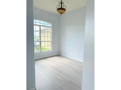 LOCATION AND MORE. This is a gorgeous and renovated one single on Oaks National Golf Course in Florida - for sale on GolfHomes.com, golf home, golf lot