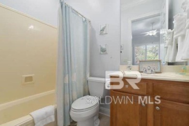 The Links Golf Villas, Unit E101.  Discover luxury coastal on Peninsula Golf and Racquet Club in Alabama - for sale on GolfHomes.com, golf home, golf lot