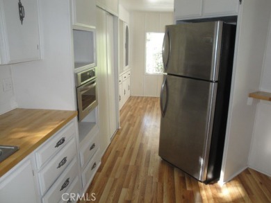 GREAT REMODELED WITH NEW PAINT, FLOORING, ROOF & APPLIANCES on Lake Oroville Golf and Event Center in California - for sale on GolfHomes.com, golf home, golf lot