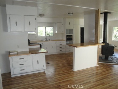 GREAT REMODELED WITH NEW PAINT, FLOORING, ROOF & APPLIANCES on Lake Oroville Golf and Event Center in California - for sale on GolfHomes.com, golf home, golf lot