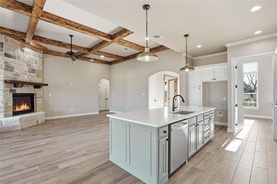 Located on a prime corner lot in the highly sought-after country on Pecan Plantation Country Club in Texas - for sale on GolfHomes.com, golf home, golf lot