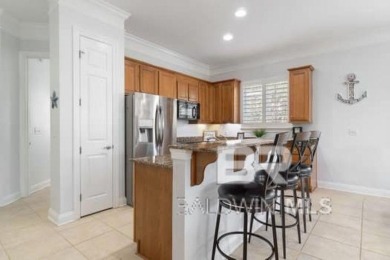 The Links Golf Villas, Unit E101.  Discover luxury coastal on Peninsula Golf and Racquet Club in Alabama - for sale on GolfHomes.com, golf home, golf lot