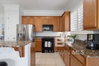 The Links Golf Villas, Unit E101.  Discover luxury coastal on Peninsula Golf and Racquet Club in Alabama - for sale on GolfHomes.com, golf home, golf lot